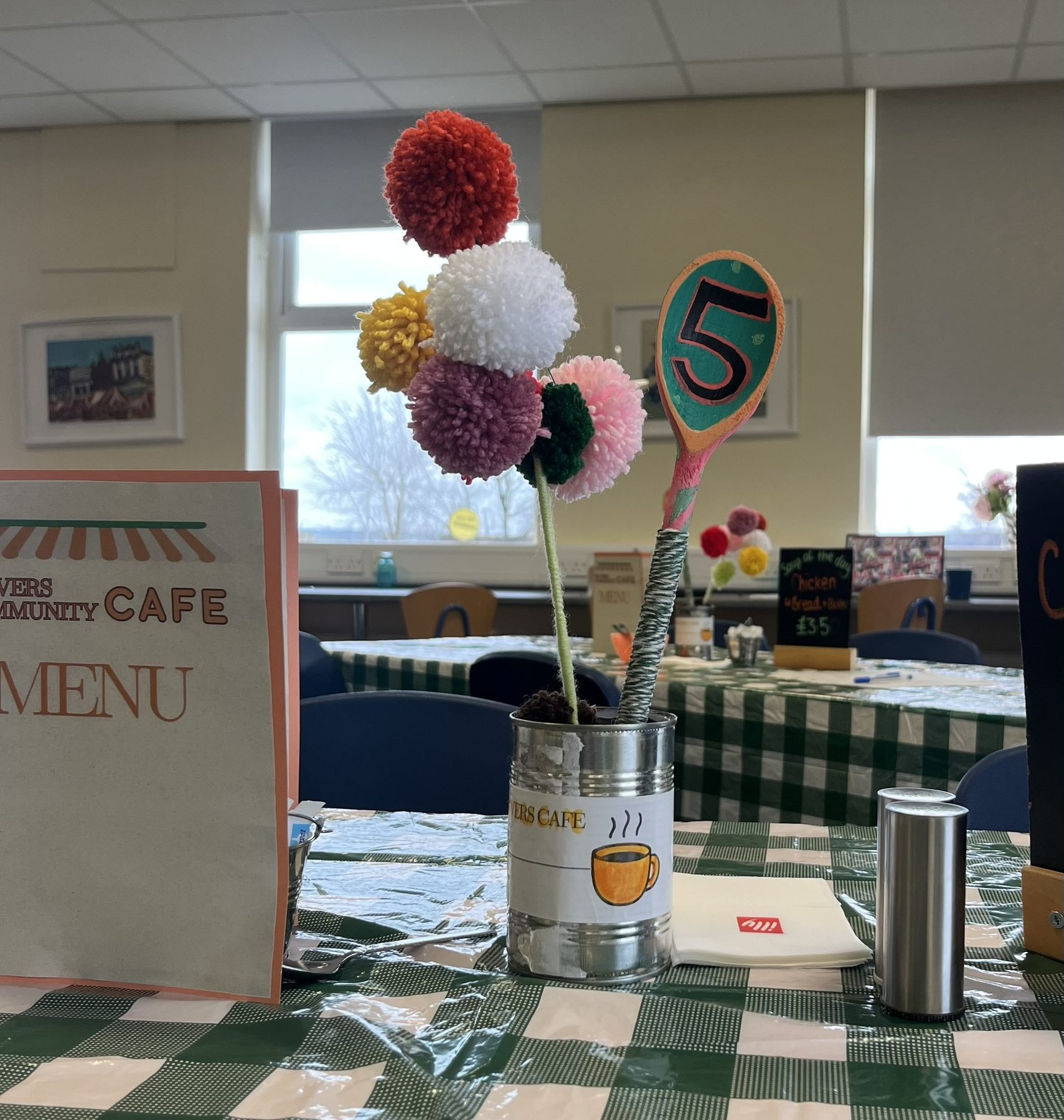 Pom-pom table decorations in the café